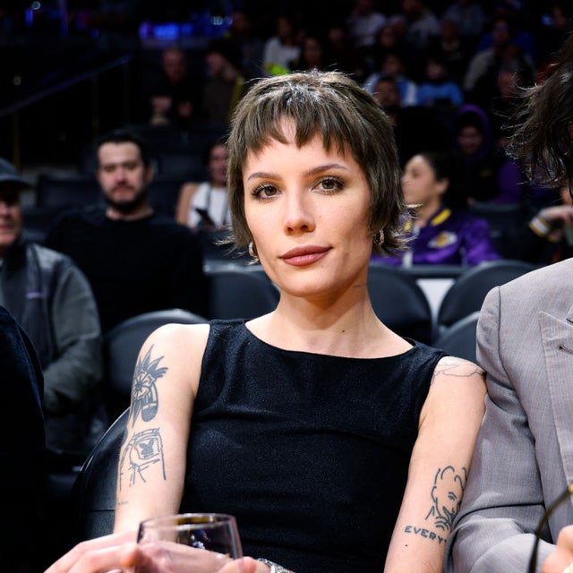 Halsey and Avan Jogia attend the basketball game between the Memphis Grizzlies and Los Angeles Lakers at Crypto.com Arena on January 5, 2024 in Los Angeles, California.
